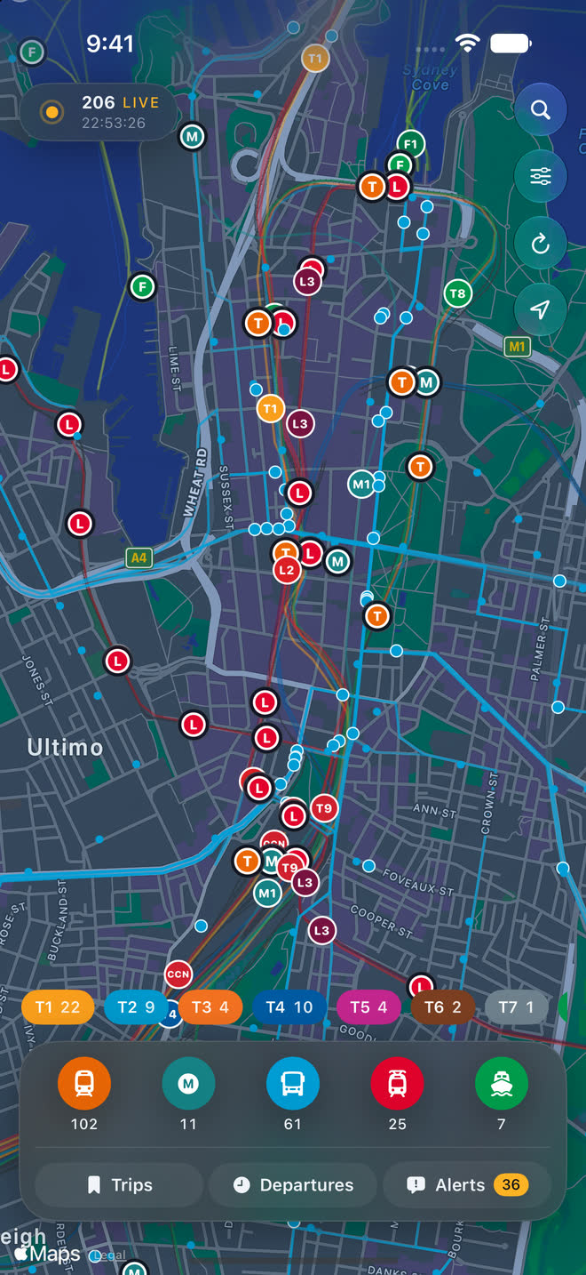 Map of Sydney showing live trains, metro, buses, ferries and light rail around the harbour and CBD