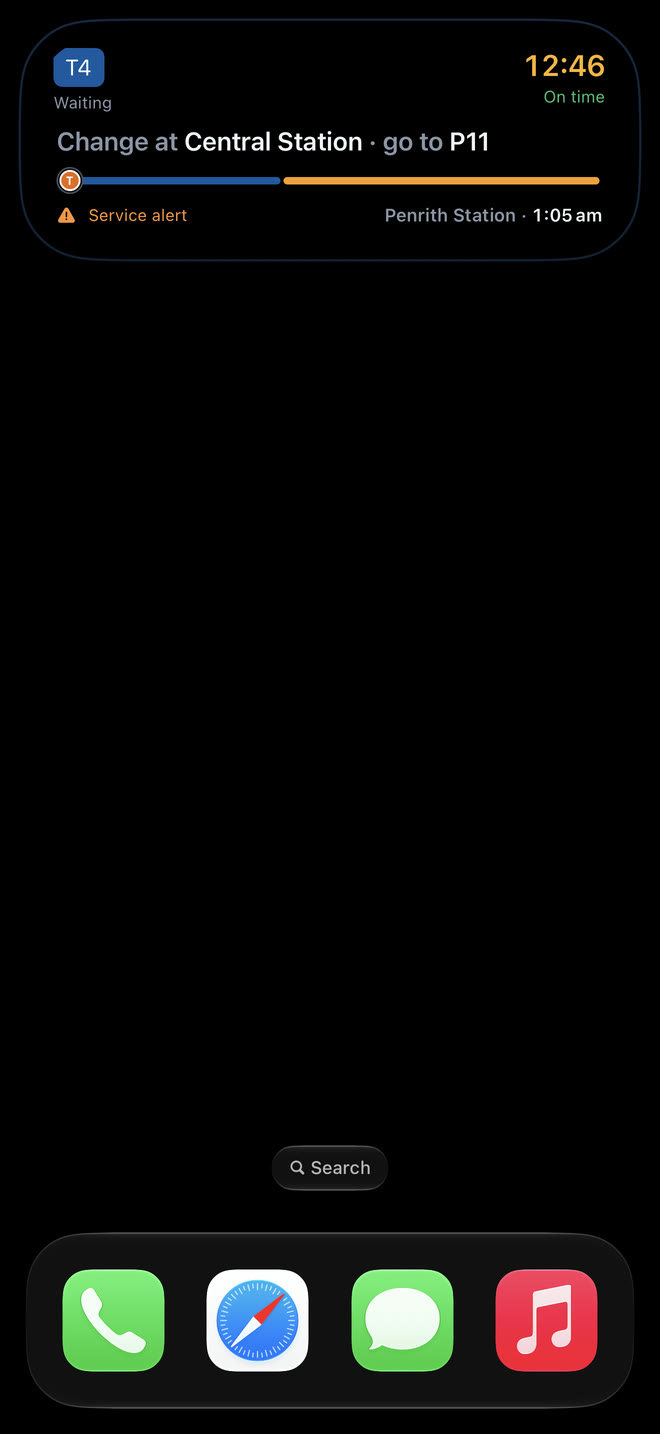 Expanded Dynamic Island showing the service, current part of the journey and live countdown
